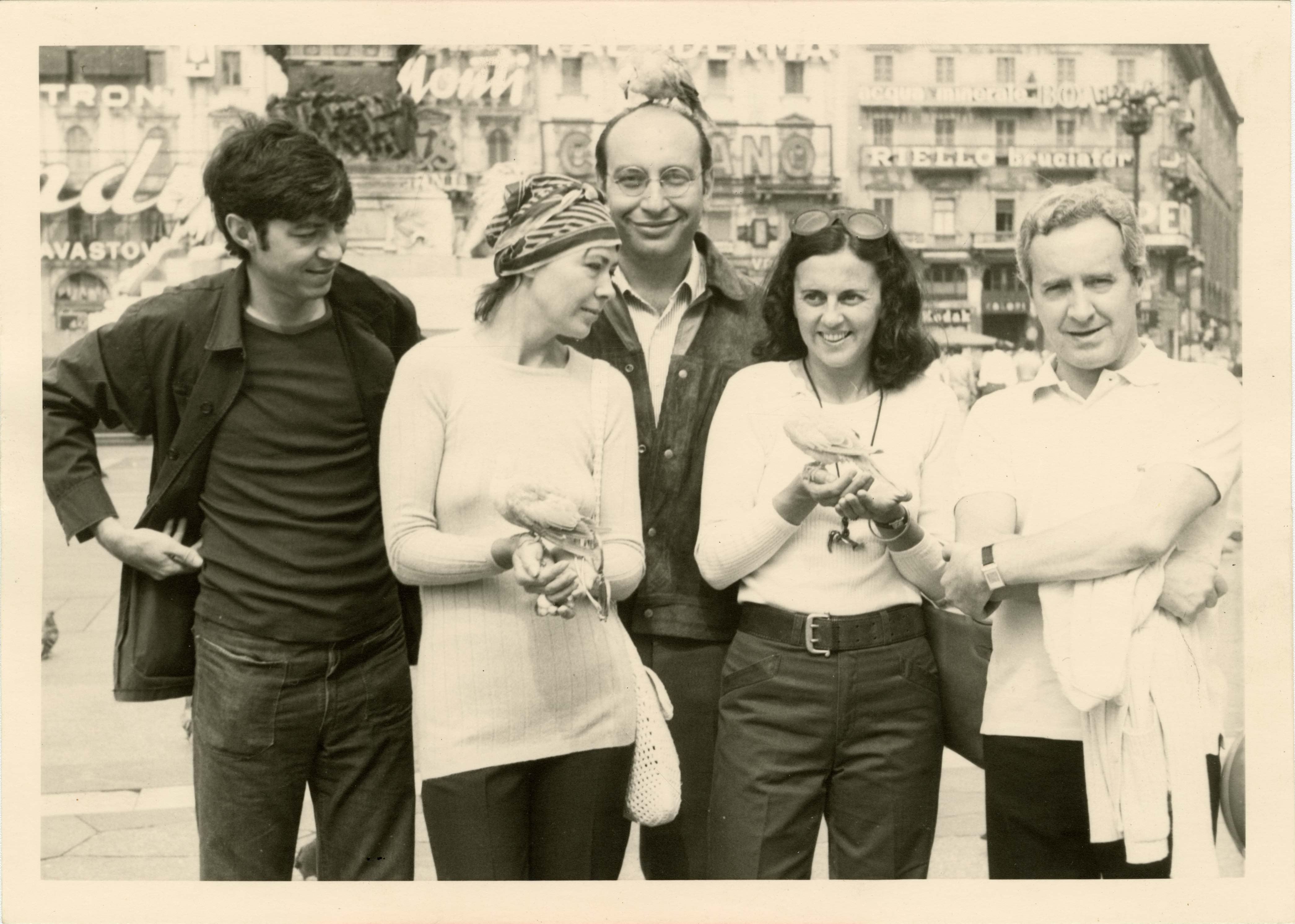 three men and two women in Italy
